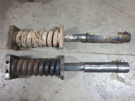 t250 track tensioner spring repair